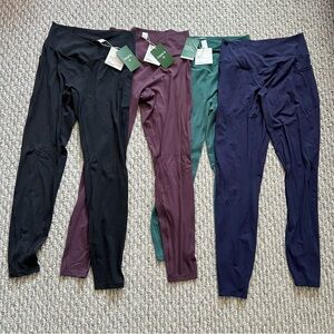 Set of Four Halara Softly Zero leggings in Black, Purple, Green, and Blue